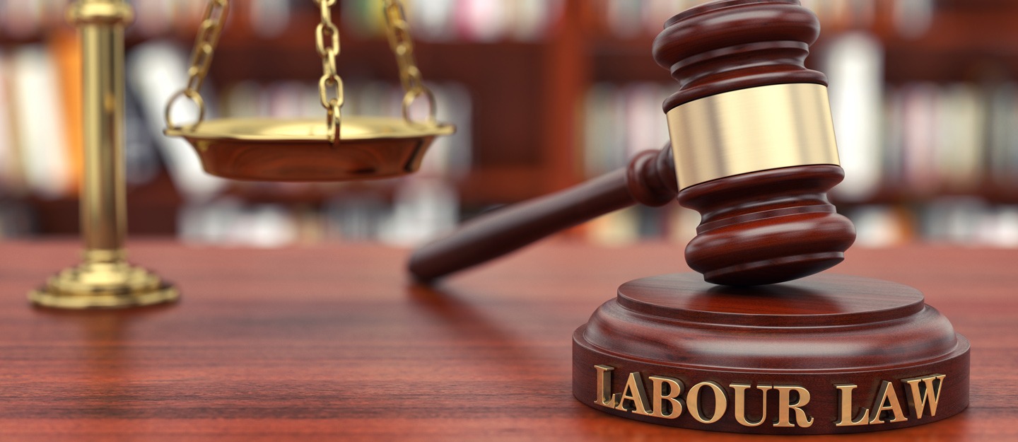 What are the penalties for breaching UAE labor laws?