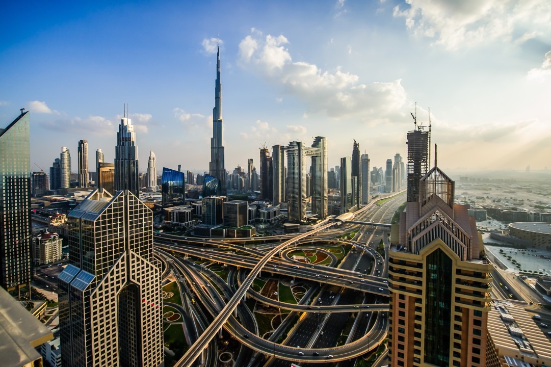 What should foreign investors know before opening a business in Dubai?