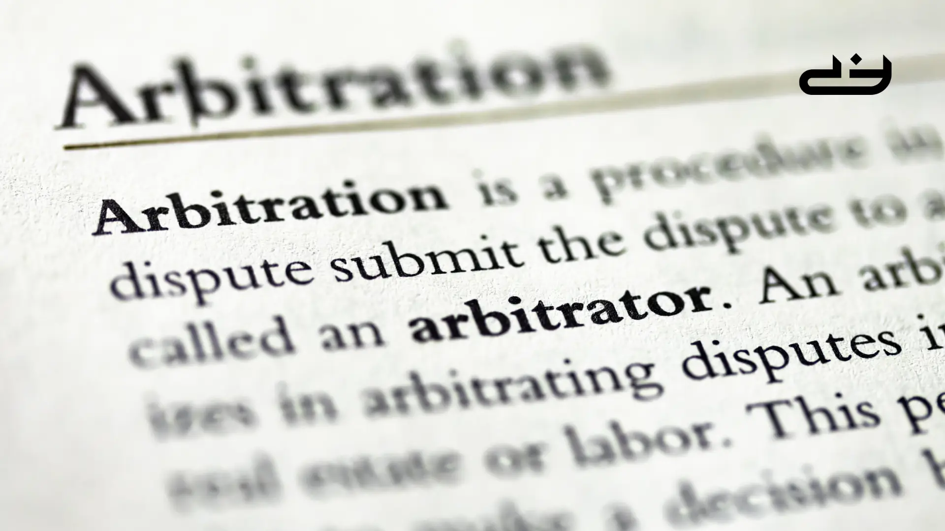 Arbitration definition from a book with a blurry effect