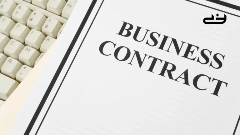 A business contract lying on the side of a keyboard